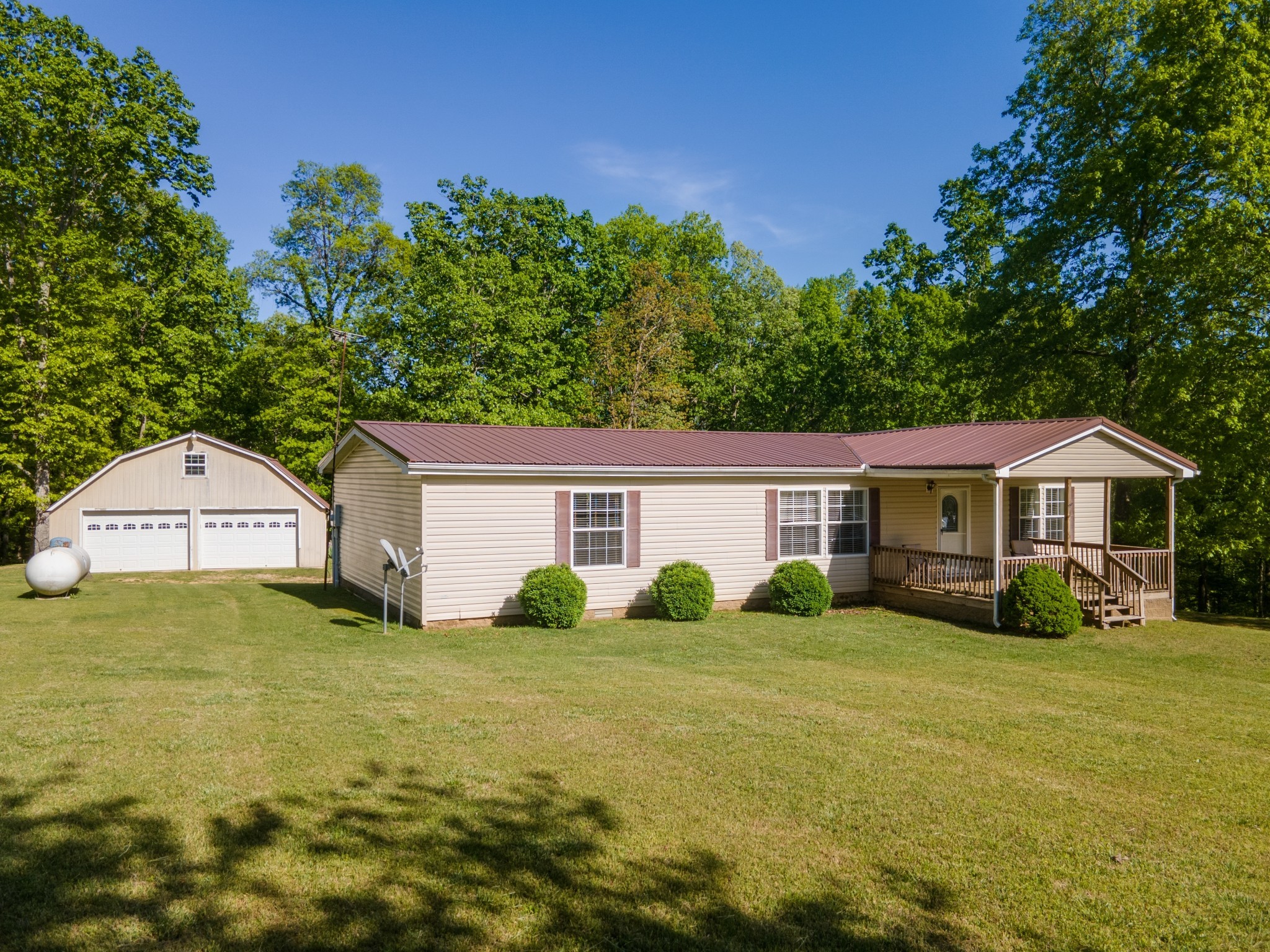 5147 Spears Road Centerville, TN 37033 - Photo 5 of 40 a front view of a house with garden
