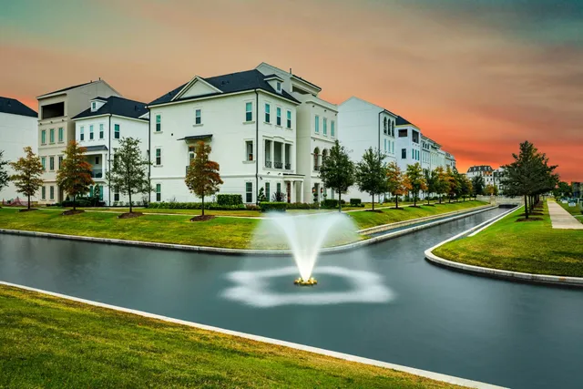 a view of a city with an ocean view