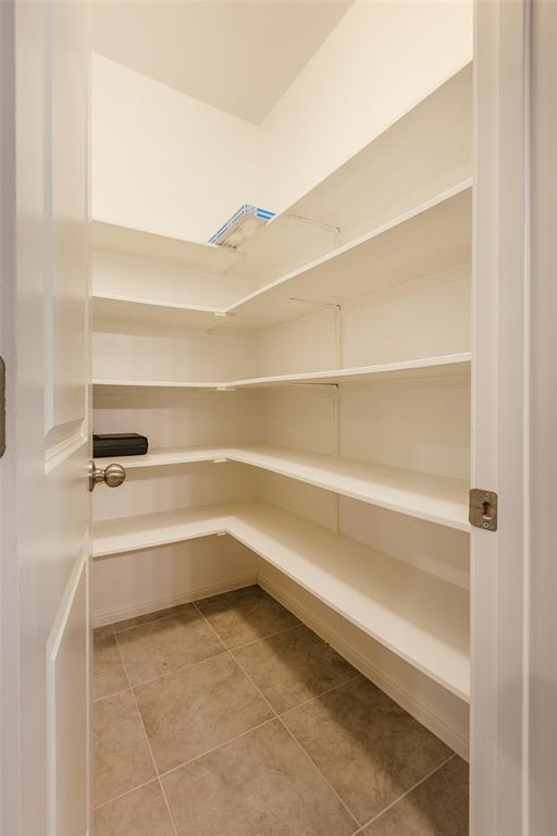 658 Nautical Loop Kyle, TX 78640 - Photo 8 of 18 a view of store room with empty racks