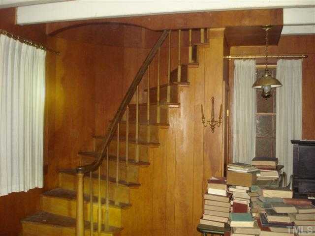 2066 Hester Road Creedmoor, NC 27522 - Photo 4 of 22 Beautiful curved staircase in the main house.