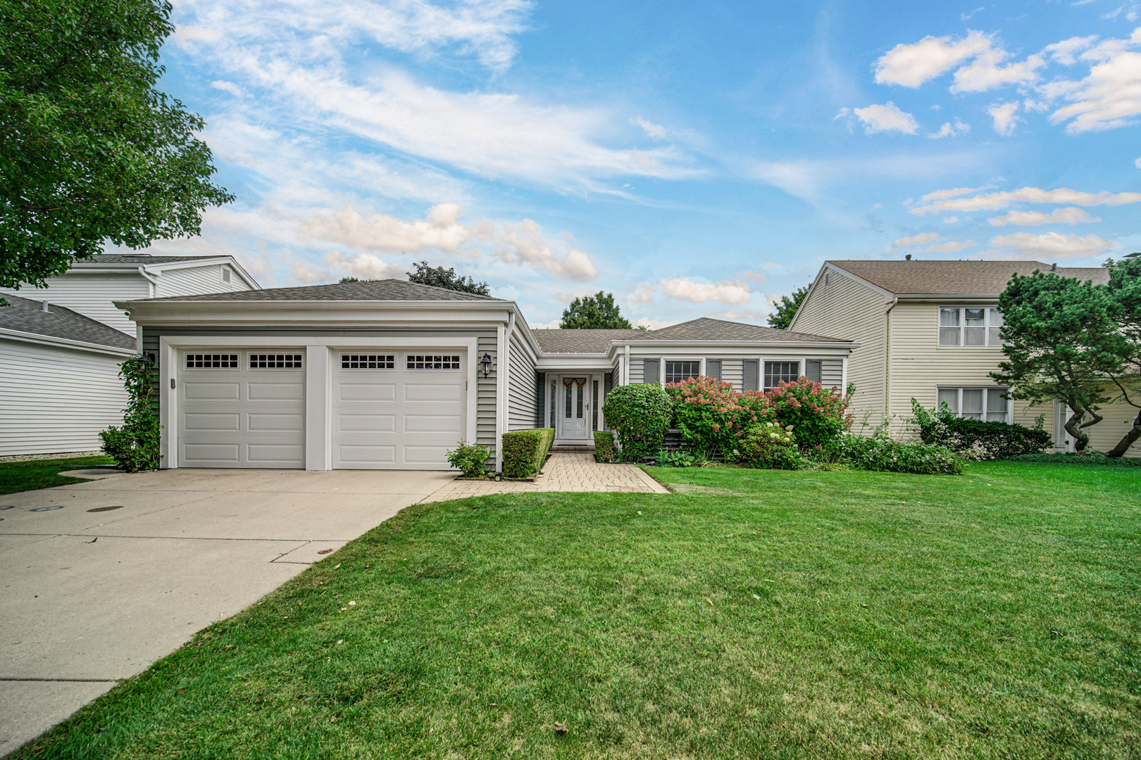 933 Shambliss Lane Buffalo Grove, IL 60089 - Photo 1 of 29 front view of a house with a yard