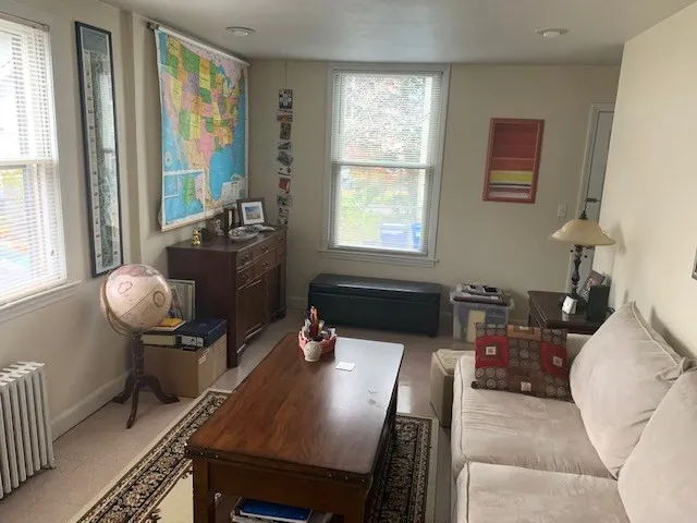 a workspace with furniture and window