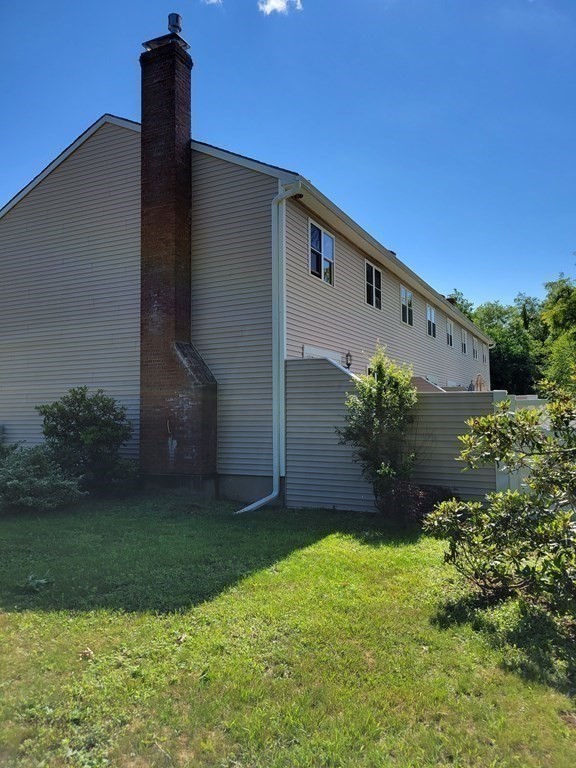 111 Brickyard Road, Unit 3G Athol, MA 01331 - Photo 7 of 16 a front view of a house with a yard