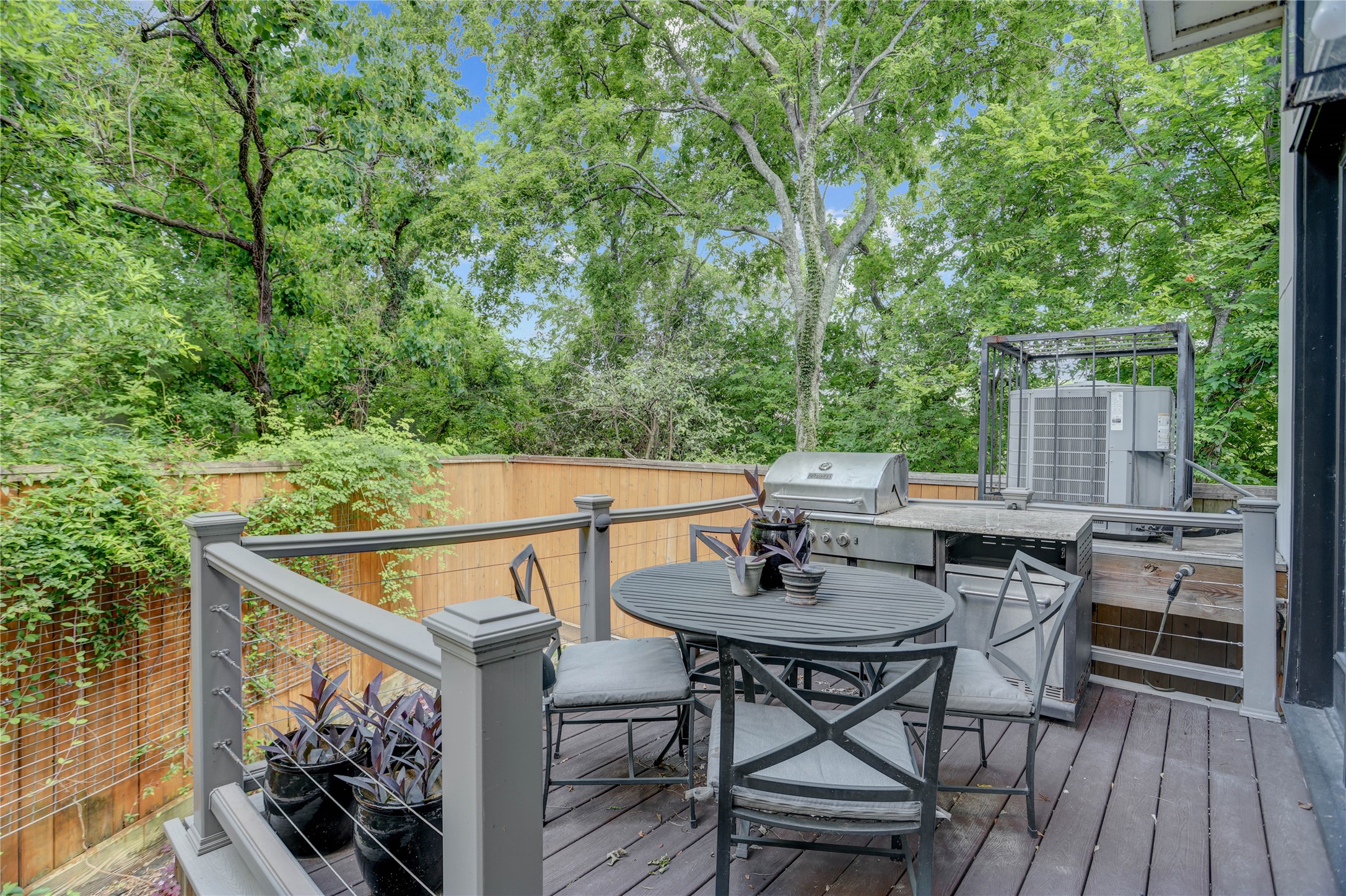 4124 Bonner View Lane Houston, TX 77007 - Photo 3 of 31 Escape to your own private oasis with this charming deck, offering the tranquility and seclusion of an adult treehouse.