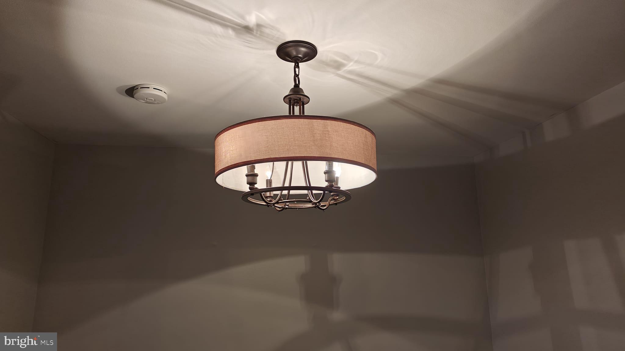 9776 Whiskey Run Laurel, MD 20723 - Photo 12 of 23 a close view of a chandelier in the bathroom