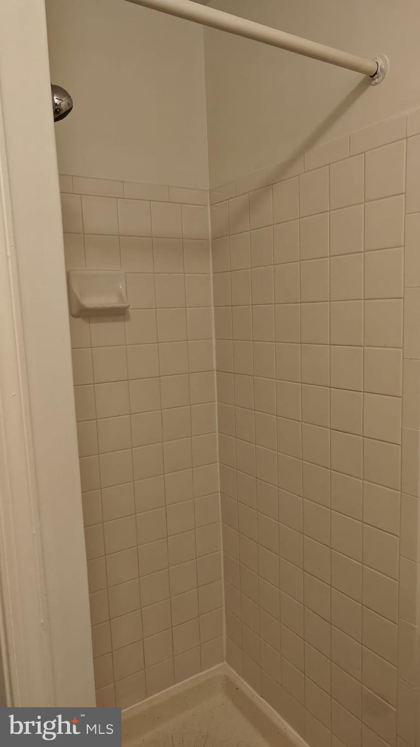 9776 Whiskey Run Laurel, MD 20723 - Photo 16 of 23 a bathroom with a shower