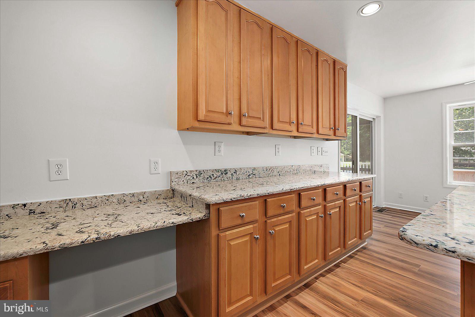12212 Brant Road Bishopville, MD 21813 - Photo 19 of 69 a kitchen with stainless steel appliances granite countertop a sink stove and cabinets