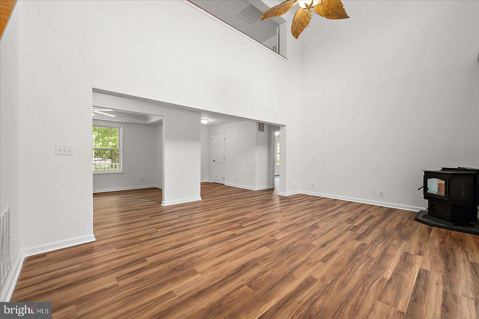 12212 Brant Road Bishopville, MD 21813 - Photo 23 of 69 a view of empty room with wooden floor