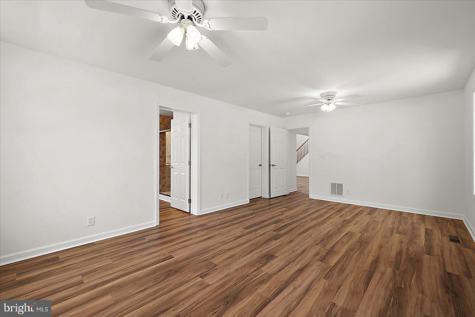 12212 Brant Road Bishopville, MD 21813 - Photo 30 of 69 a view of empty room with wooden floor and fan