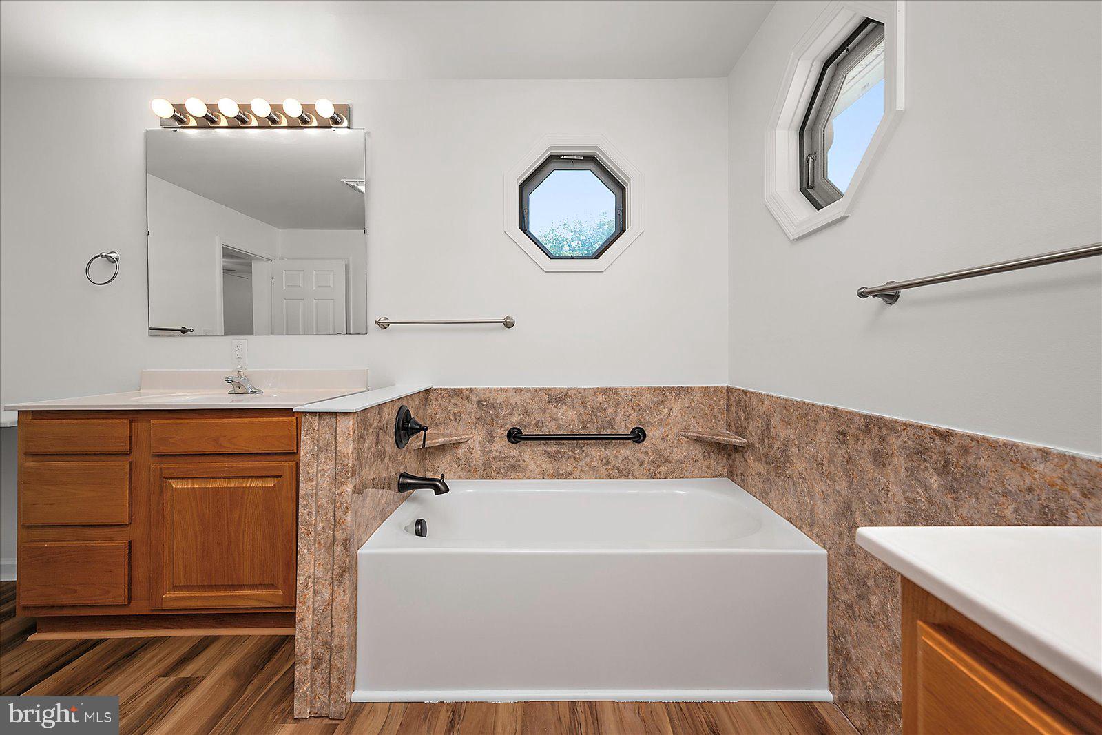 12212 Brant Road Bishopville, MD 21813 - Photo 36 of 69 a bathroom with a bathtub and a sink