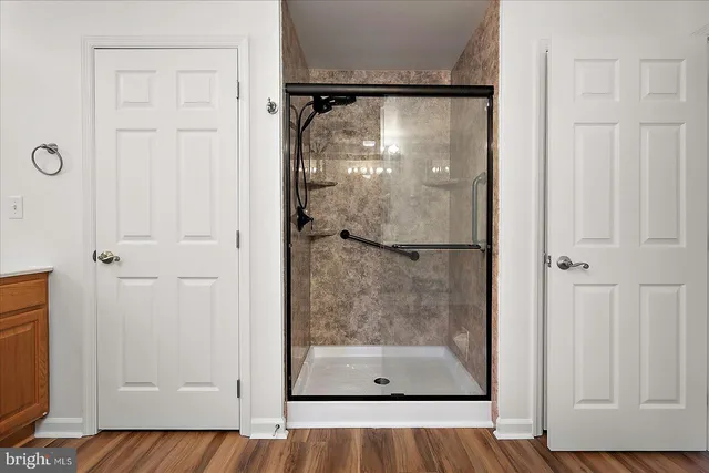 a bathroom with a sink a vanity and a mirror