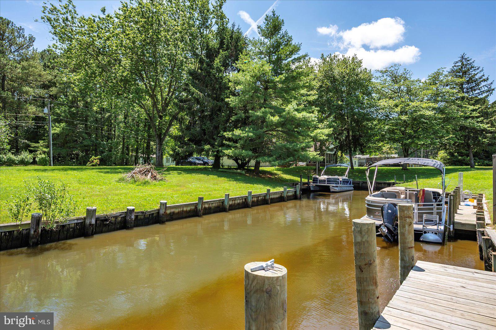 12212 Brant Road Bishopville, MD 21813 - Photo 5 of 69 a view of a lake with houses