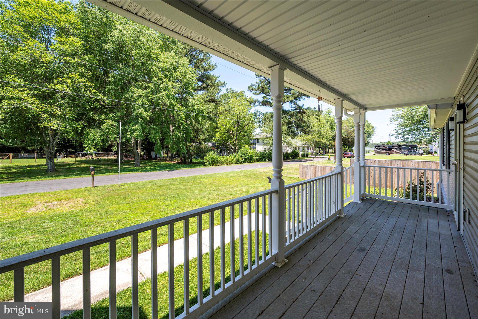 12212 Brant Road Bishopville, MD 21813 - Photo 62 of 69 a view of outdoor space with deck and a garden