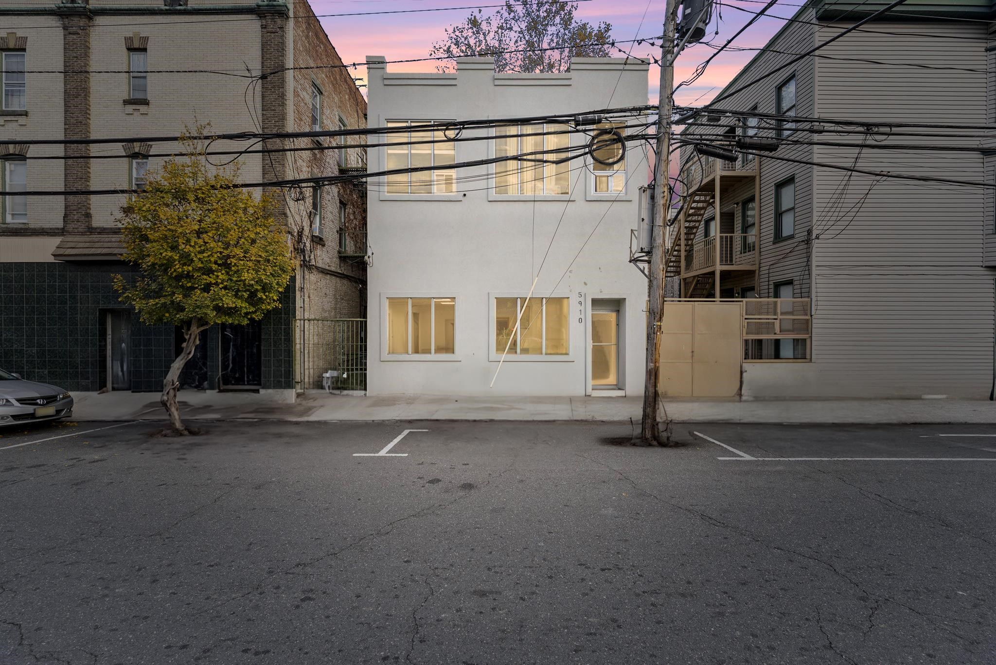 a view of a house with a street