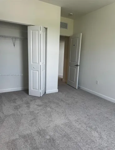 an empty room with a door