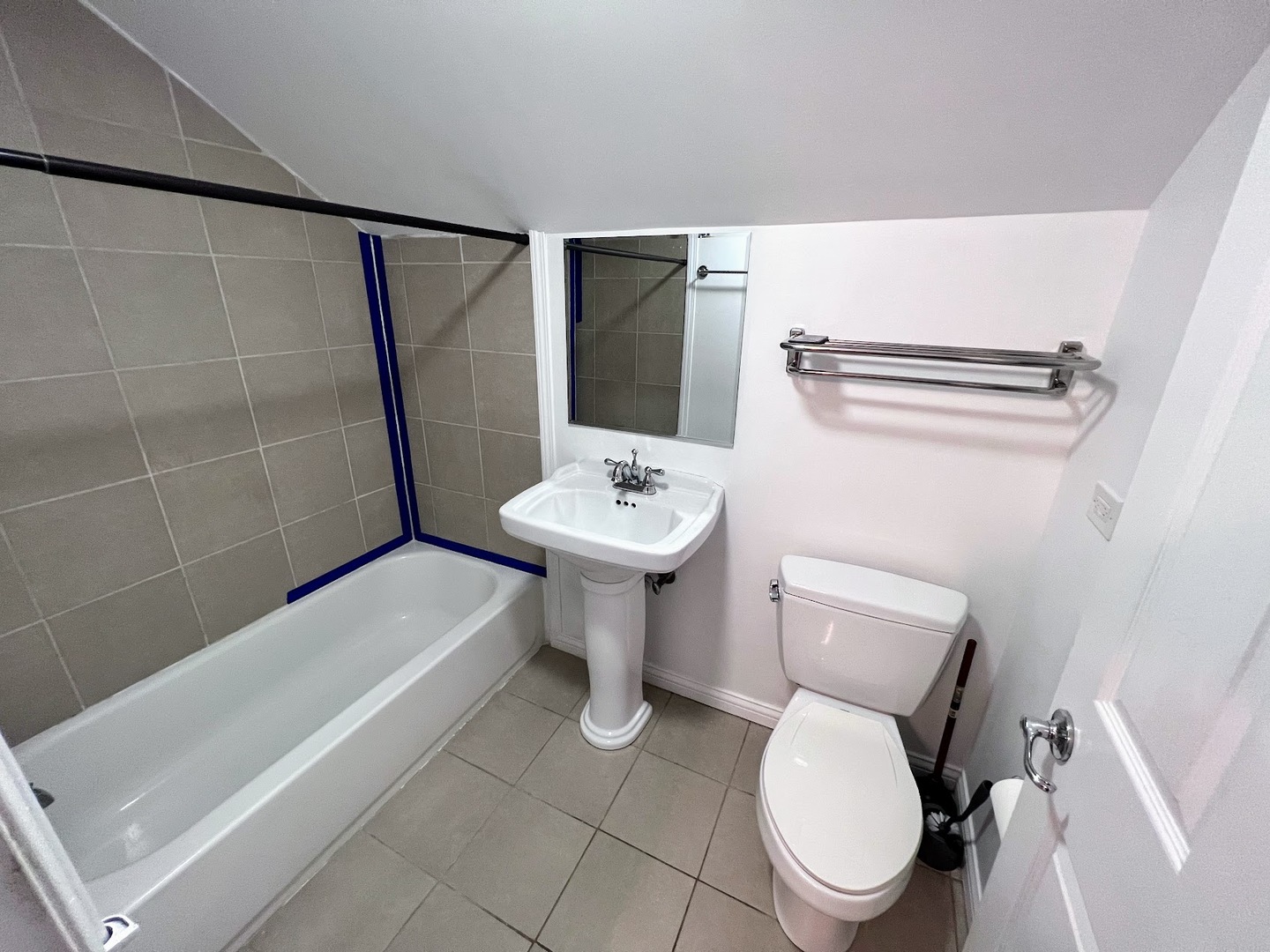 218 South Church Street, Unit 4 Wauconda, IL 60084 - Photo 9 of 11 a bathroom with a sink a toilet and shower