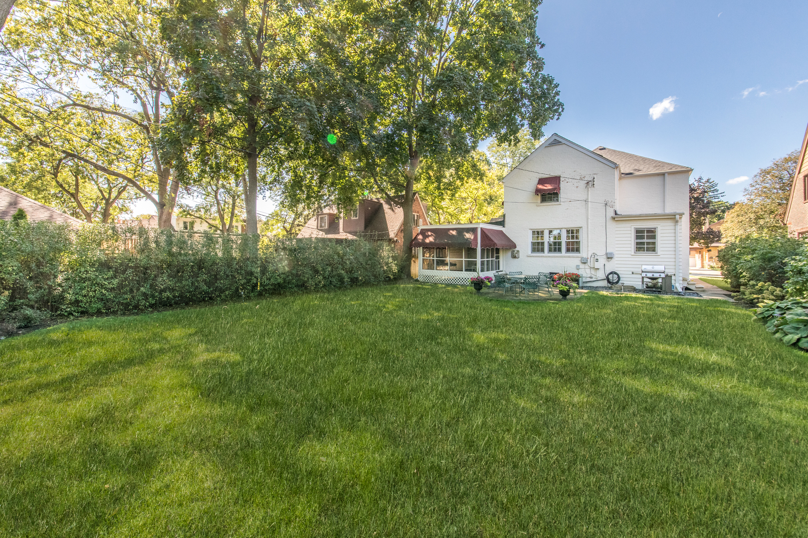 205 North Merrill Street Park Ridge, IL 60068 - Photo 2 of 9 a front view of a house with garden