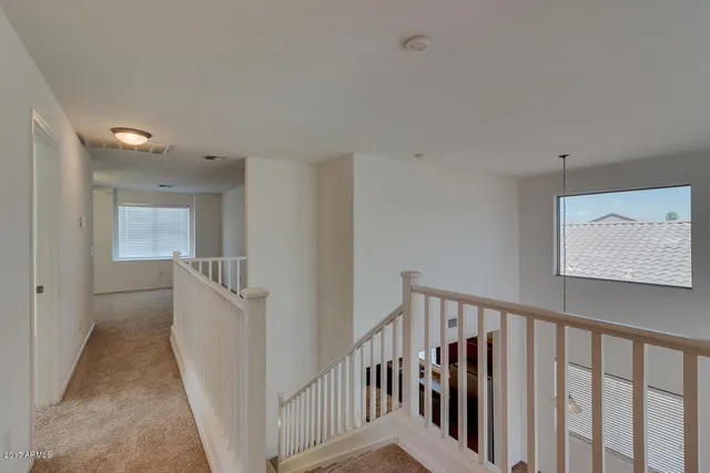 a view of hallway with stairs