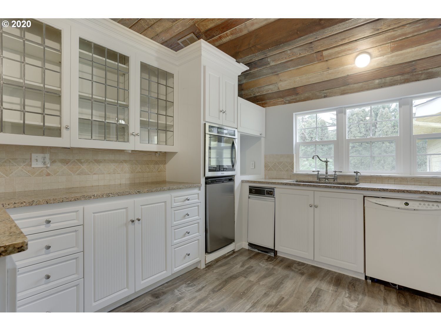 20379 South Ferguson Road Oregon City, OR 97045 - Photo 16 of 32 a kitchen with granite countertop cabinets and window