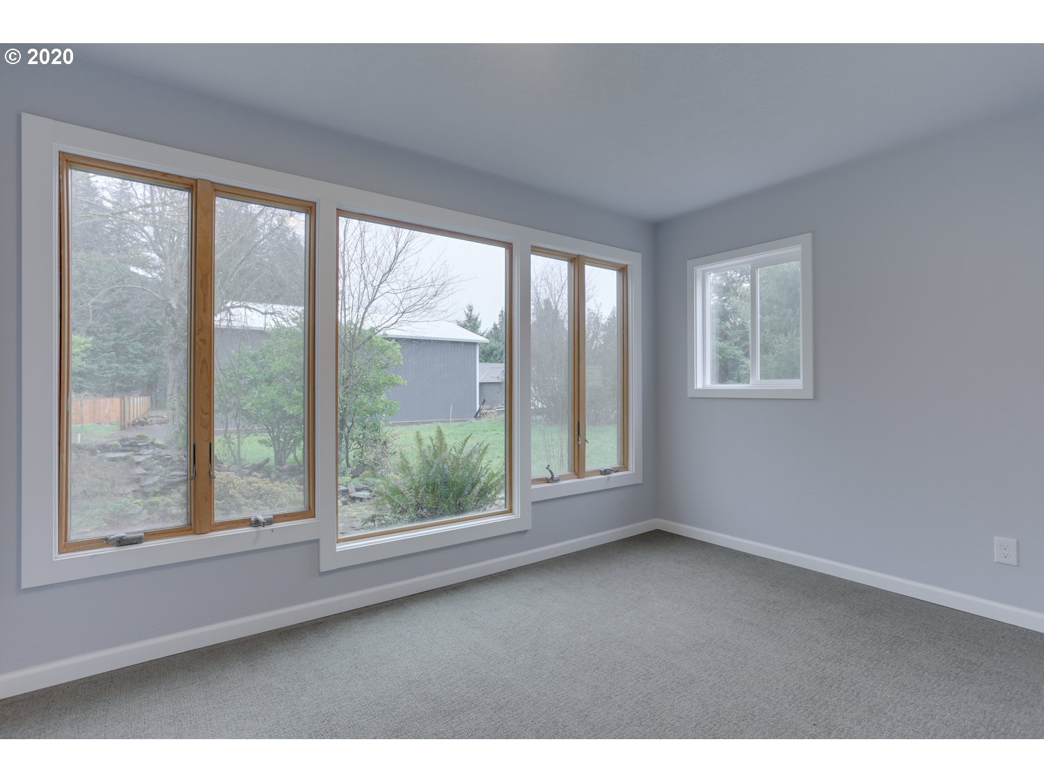 20379 South Ferguson Road Oregon City, OR 97045 - Photo 19 of 32 an empty room with windows
