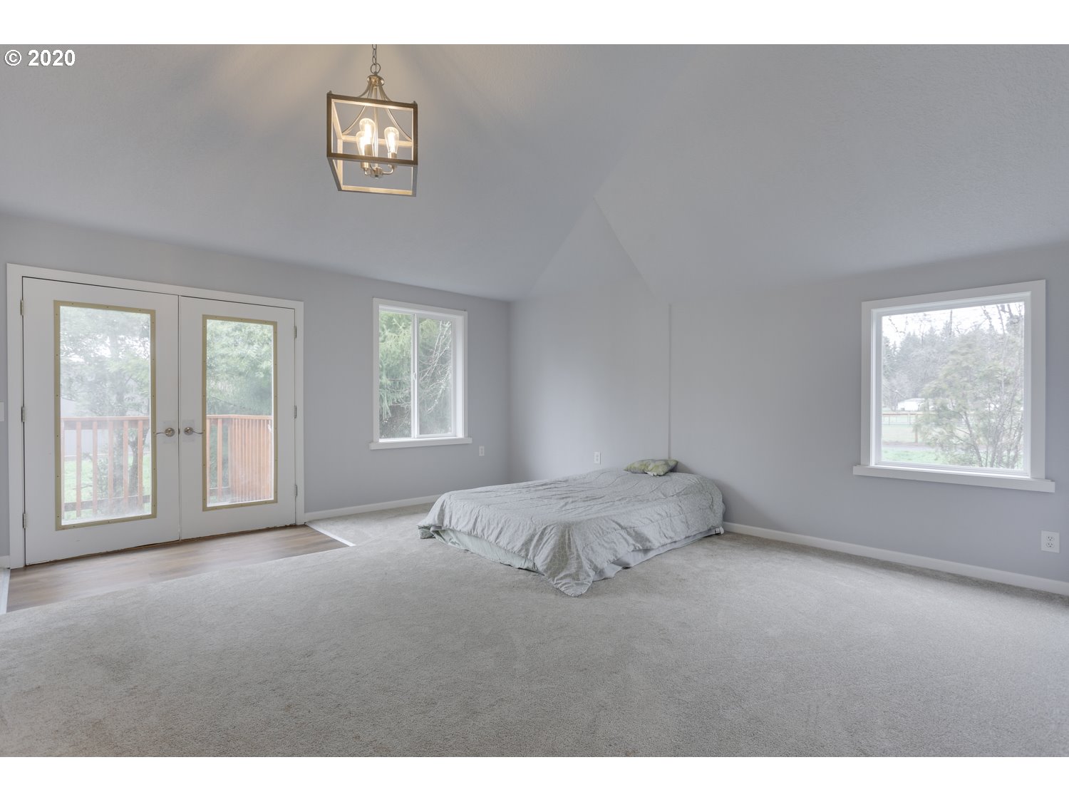 20379 South Ferguson Road Oregon City, OR 97045 - Photo 23 of 32 a bedroom with a bed and a window