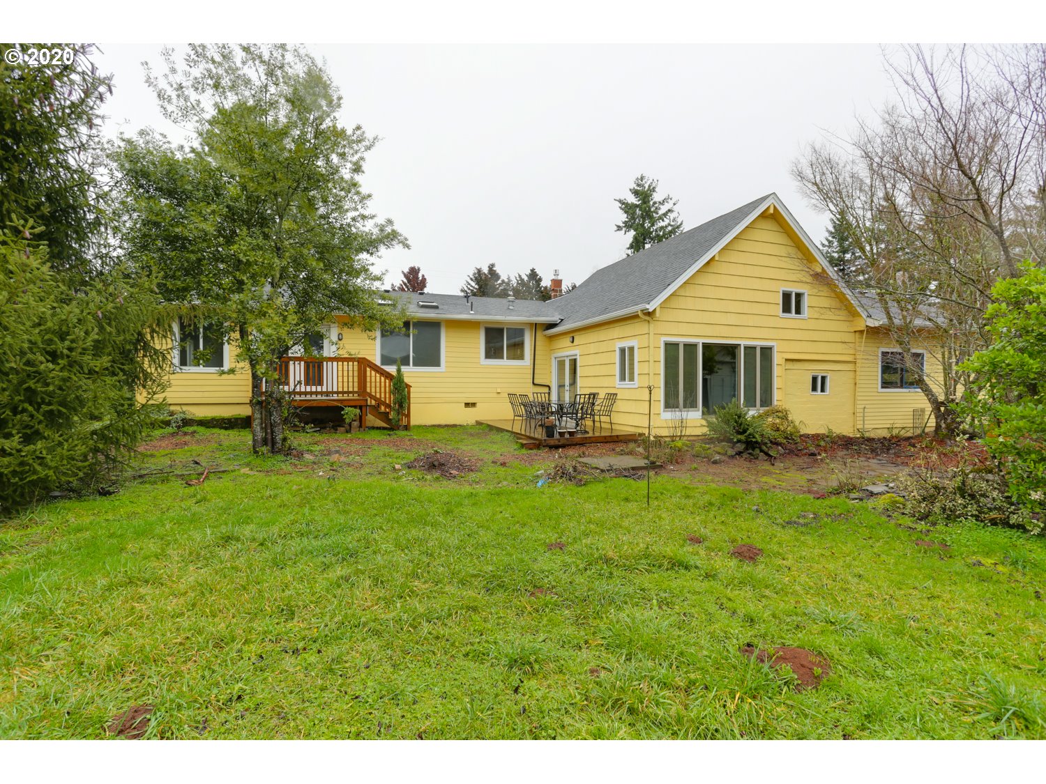 20379 South Ferguson Road Oregon City, OR 97045 - Photo 31 of 32 a front view of a house with a garden