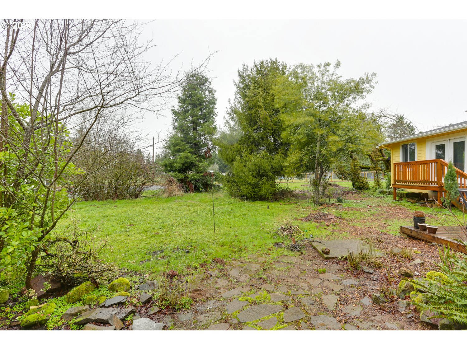 20379 South Ferguson Road Oregon City, OR 97045 - Photo 32 of 32 a view of a backyard with large trees