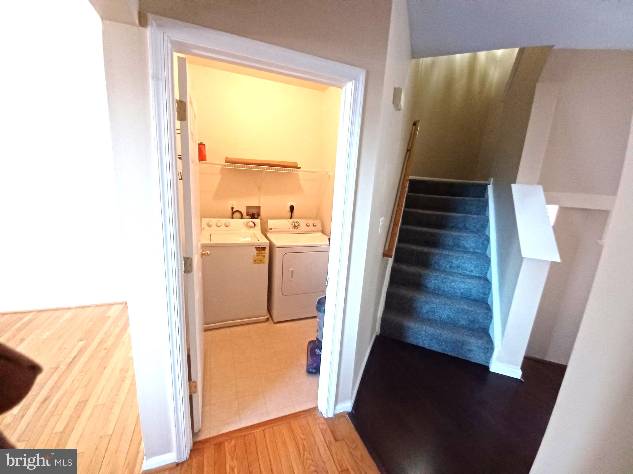 1549 Falling Brook Court Odenton, MD 21113 - Photo 3 of 43 a view of a room with wooden floor and windows