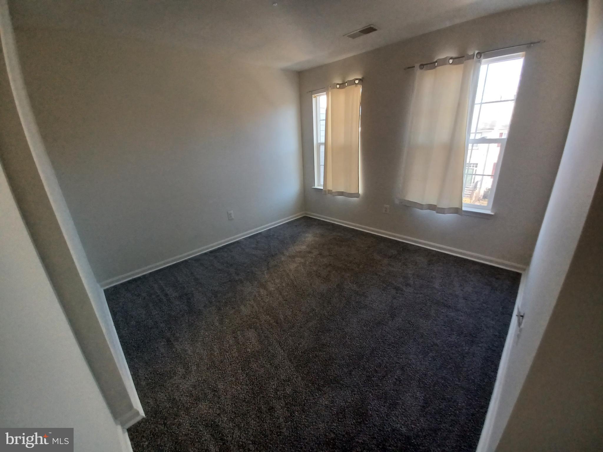 1549 Falling Brook Court Odenton, MD 21113 - Photo 36 of 43 an empty room with windows