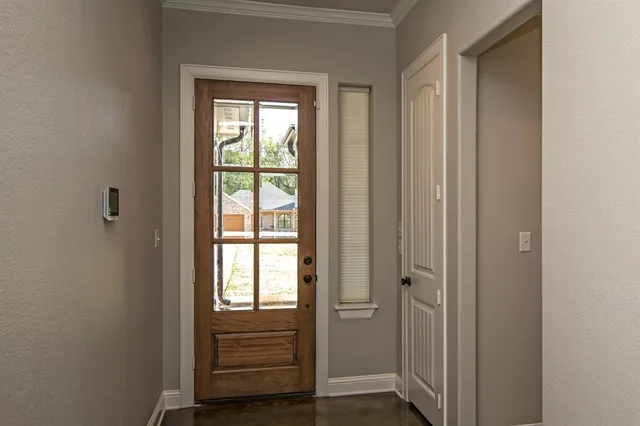 a view of wooden floor and closet