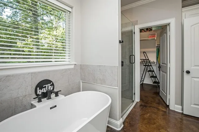 a bathroom with a sink and a bathtub