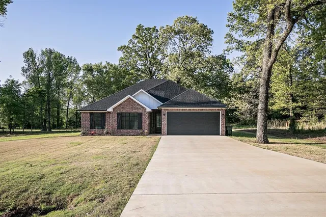 a house with trees in the background