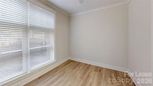 a view of a room that has a window