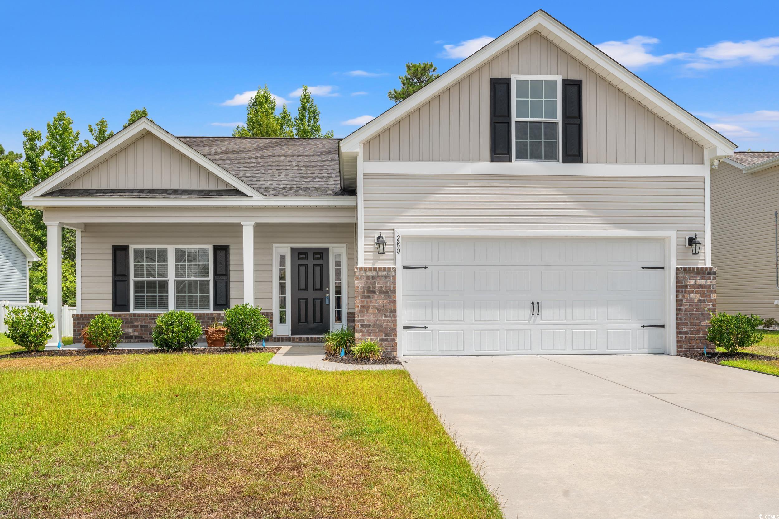 280 Palm Terrace Loop Conway, SC 29526 - Photo 1 of 29 Craftsman-style house featuring a garage and a fro
