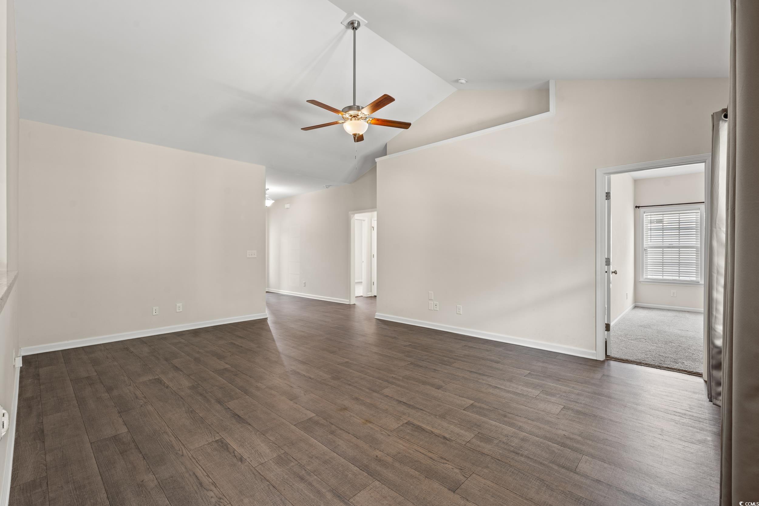 280 Palm Terrace Loop Conway, SC 29526 - Photo 16 of 29 Carpeted spare room with high vaulted ceiling and
