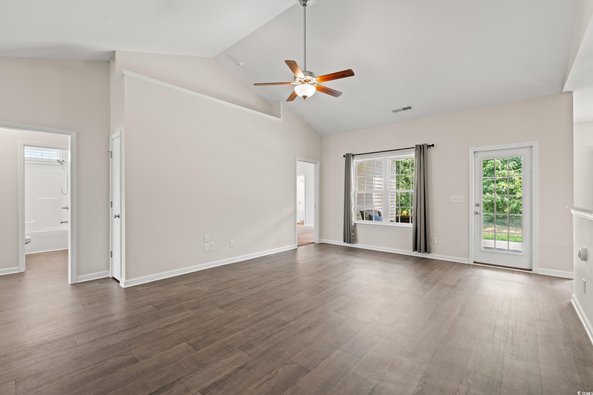 280 Palm Terrace Loop Conway, SC 29526 - Photo 9 of 29 Unfurnished living room with ceiling fan, high vau
