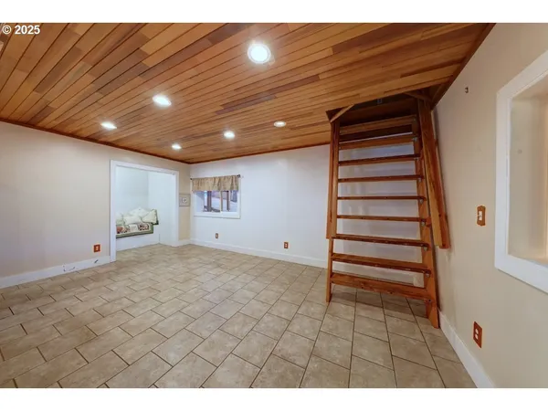 a kitchen with stainless steel appliances granite countertop a refrigerator stove and sink