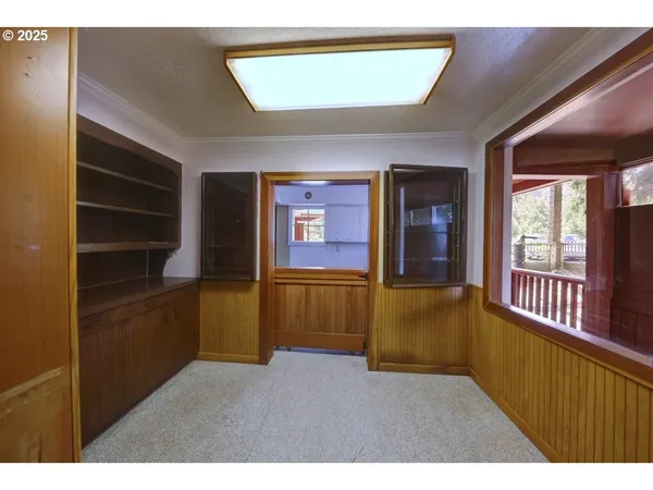 a living room with furniture and window