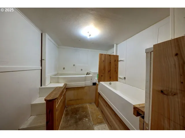 a room with a table and chairs