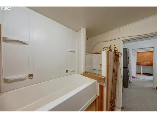 a room with furniture and a large window