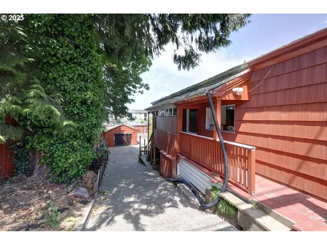 a view of balcony with wooden floor and outdoor space