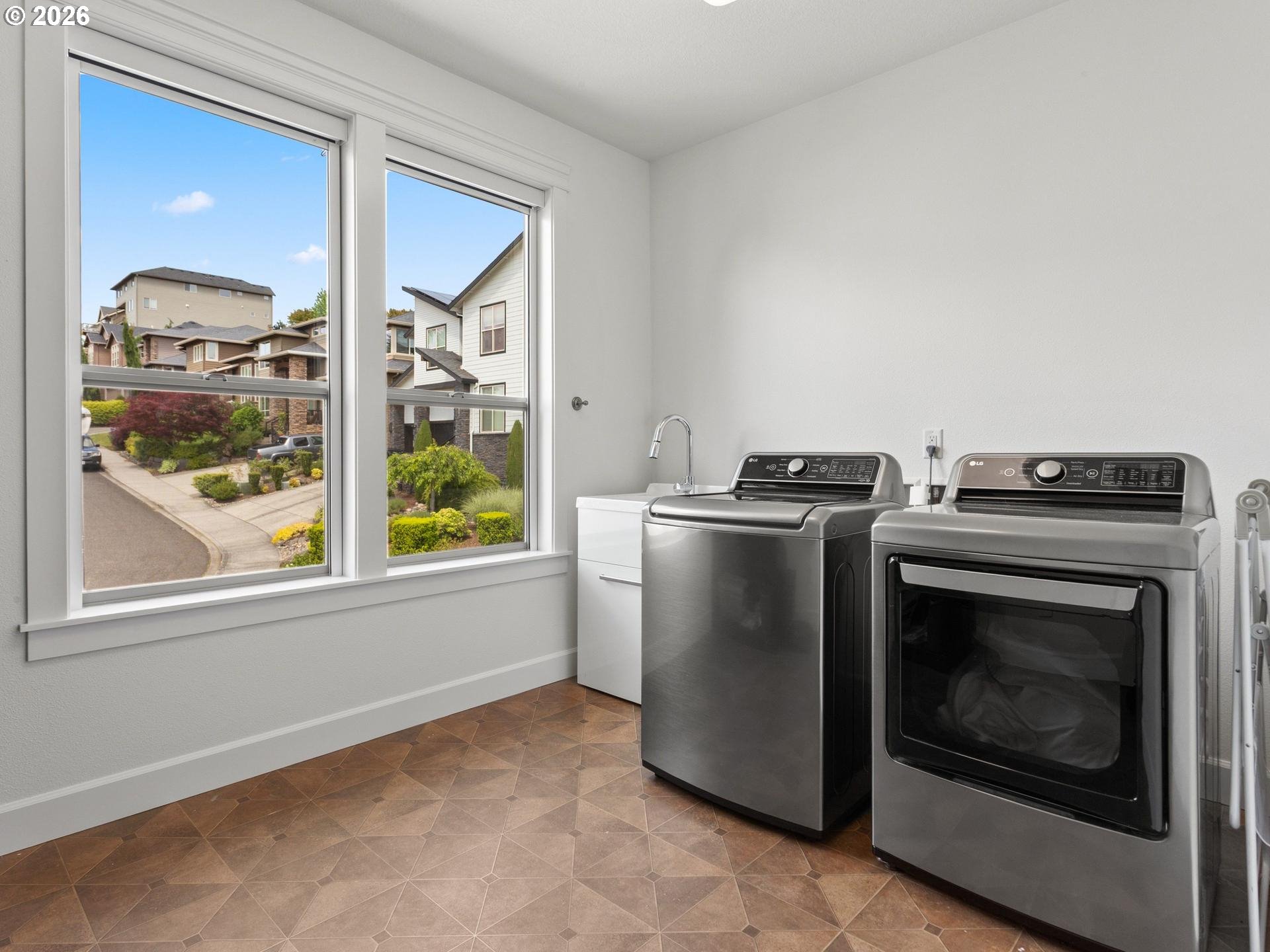 1012 Northwest Goodwin Street Camas, WA 98607 - Photo 33 of 44 a utility room with washer and dryer