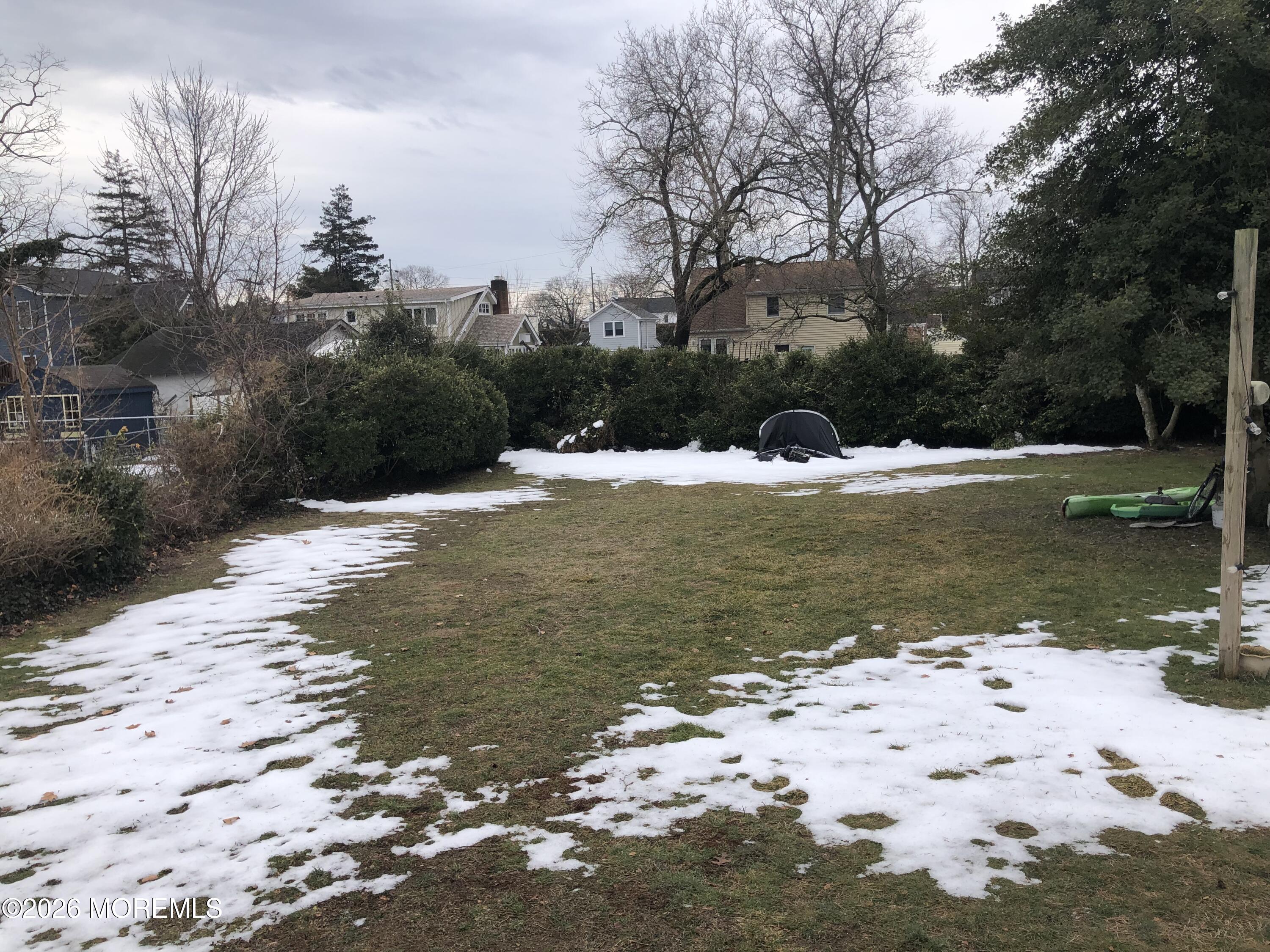 1122 Pine Bluff Avenue Point Pleasant, NJ 08742 - Photo 2 of 10 a view of a lake with a beach