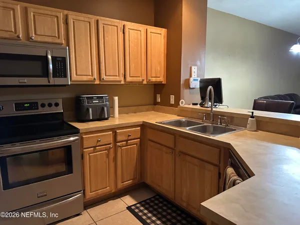 $235,000 | 3750 Silver Bluff Boulevard, Unit 402, Orange Park, FL 32065