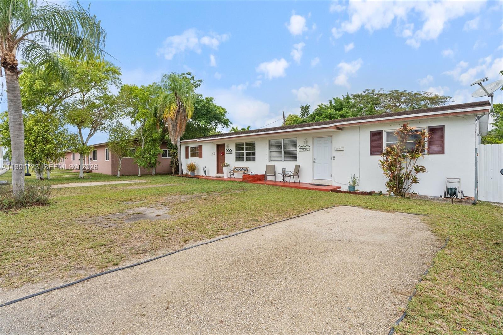 9601-9603 Southwest 36th Street Miami, FL 33165 - Photo 2 of 45 a view of house with outdoor space and shower