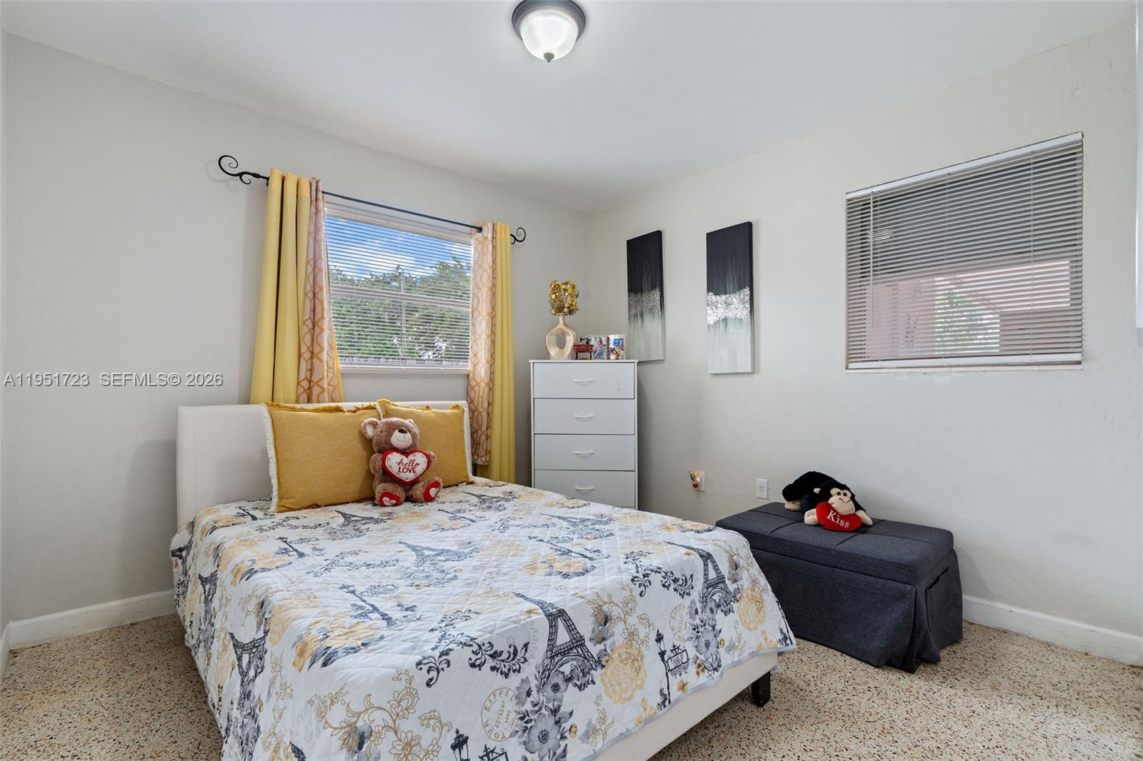 9601-9603 Southwest 36th Street Miami, FL 33165 - Photo 21 of 45 a bedroom with a bed and a window