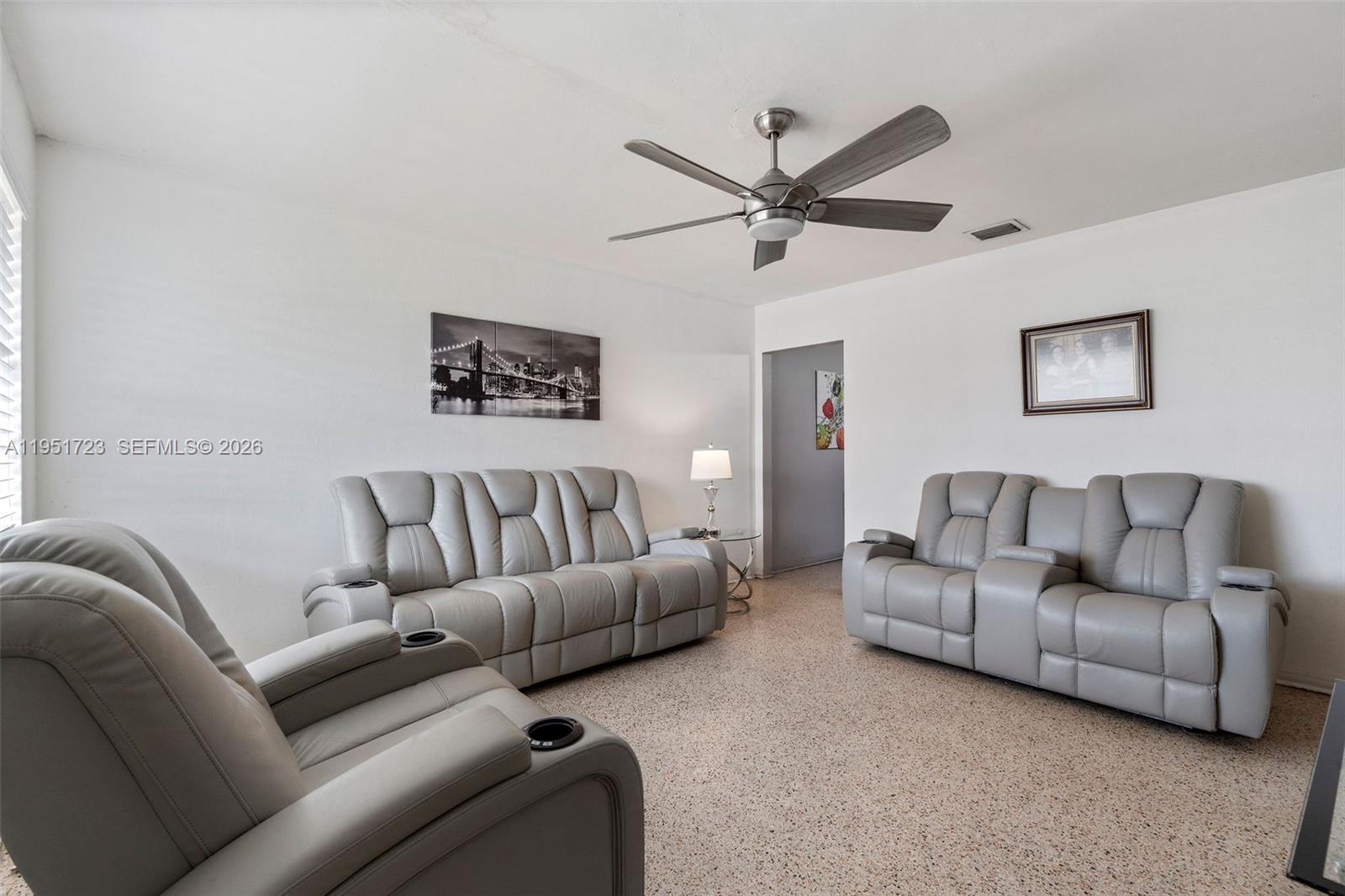 9601-9603 Southwest 36th Street Miami, FL 33165 - Photo 31 of 45 a living room with a couch