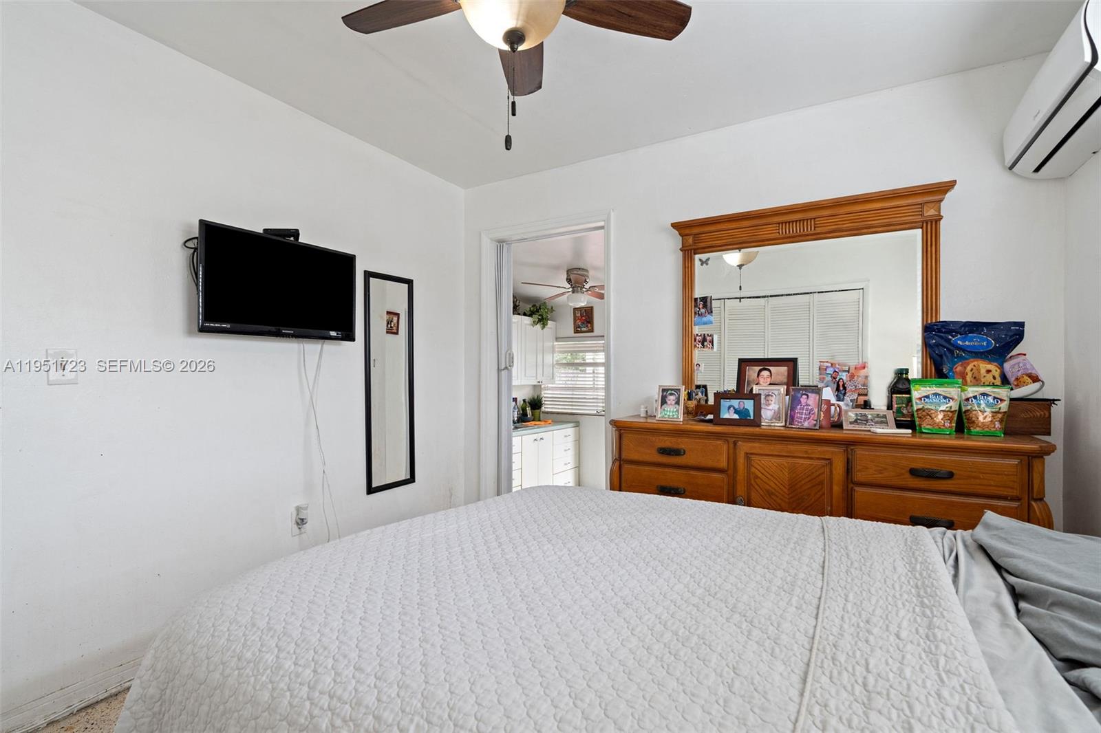 9601-9603 Southwest 36th Street Miami, FL 33165 - Photo 35 of 45 a bed room with a bed and a television