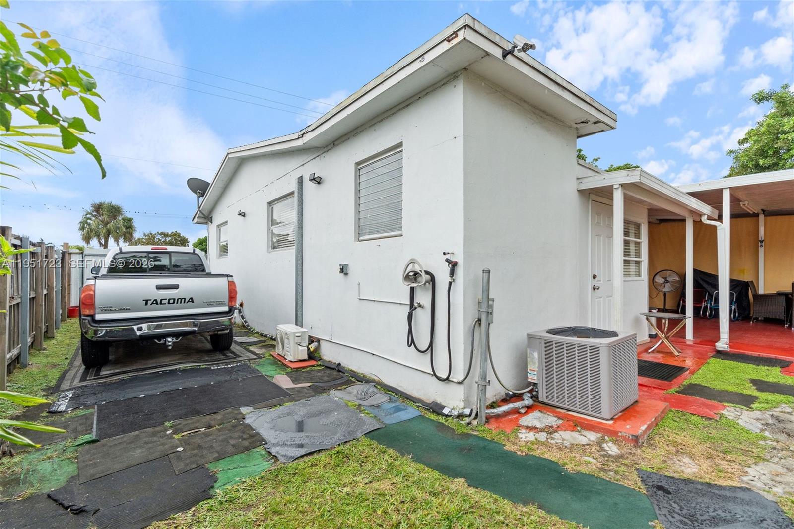 9601-9603 Southwest 36th Street Miami, FL 33165 - Photo 37 of 45 a view of a backyard with a patio