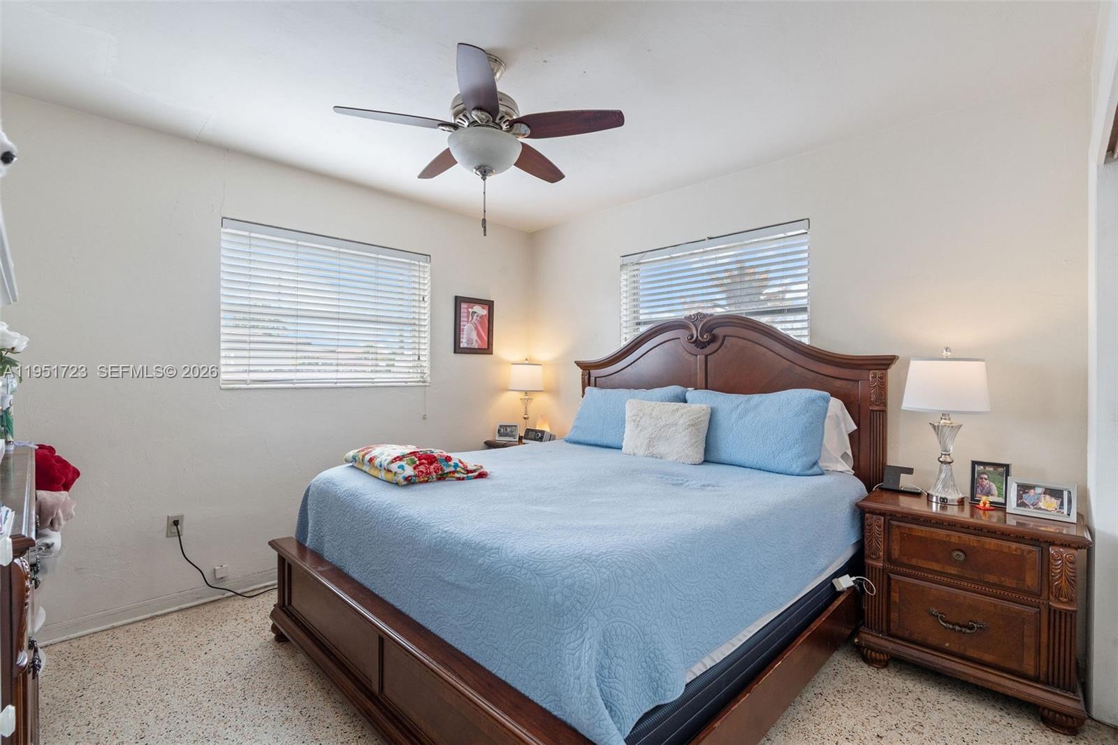 9601-9603 Southwest 36th Street Miami, FL 33165 - Photo 44 of 45 a bedroom with a bed and a window